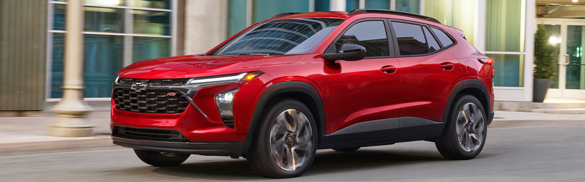 A red 2026 Chevrolet Blazer displayed prominently, showcasing its sleek design and modern features.